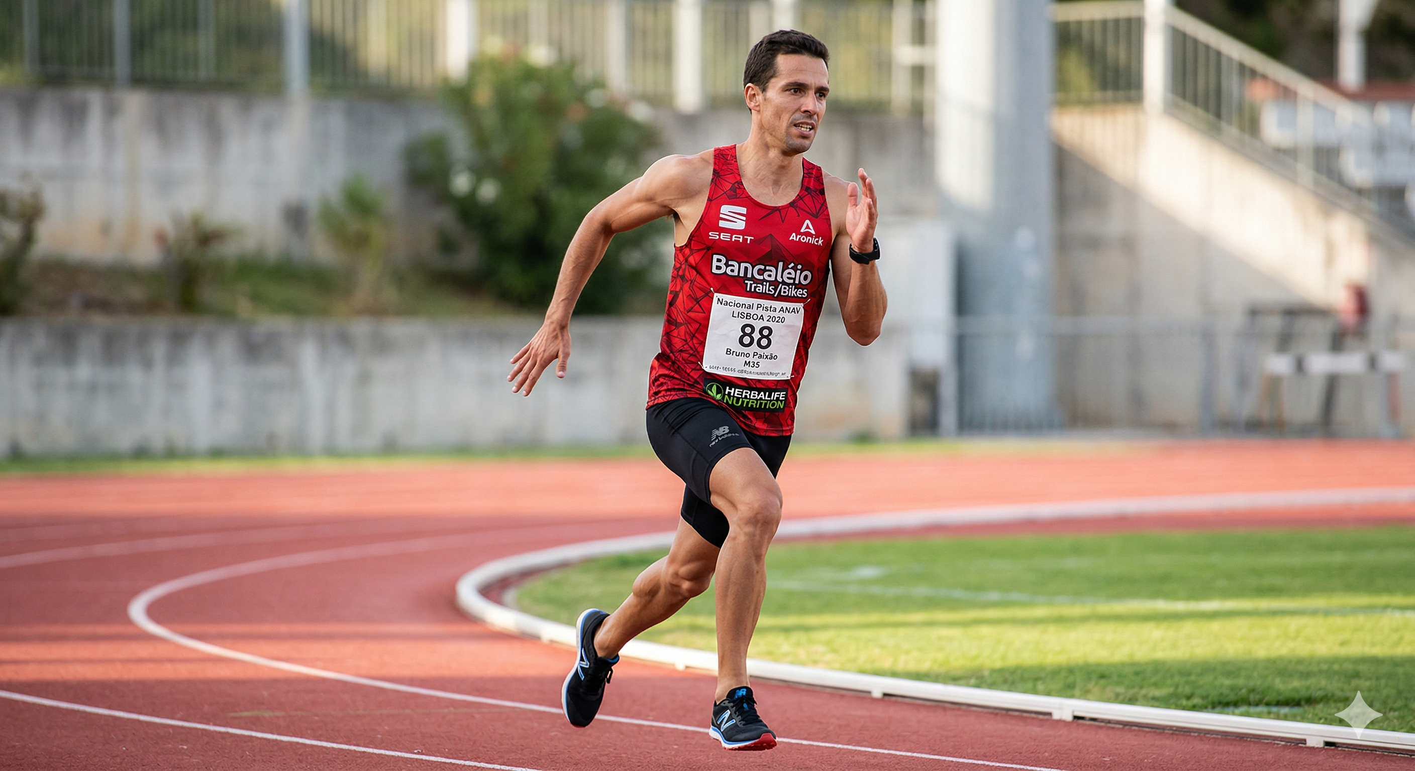 Elite athlete running on track